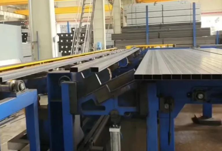 Square tube on the unloading table of a spray paint line