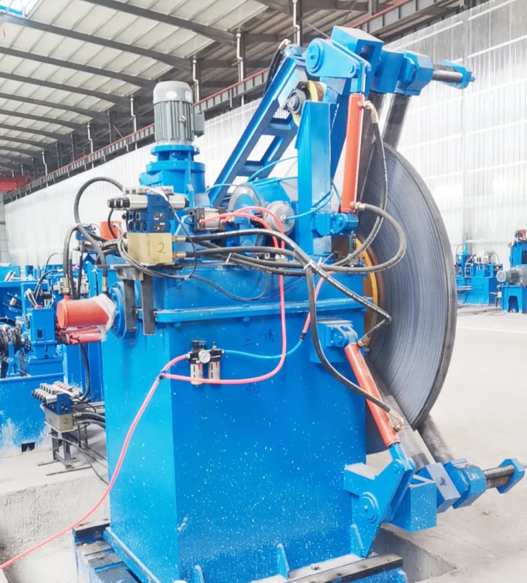Uncoiler with a strip coil at the entry of the H-beam line