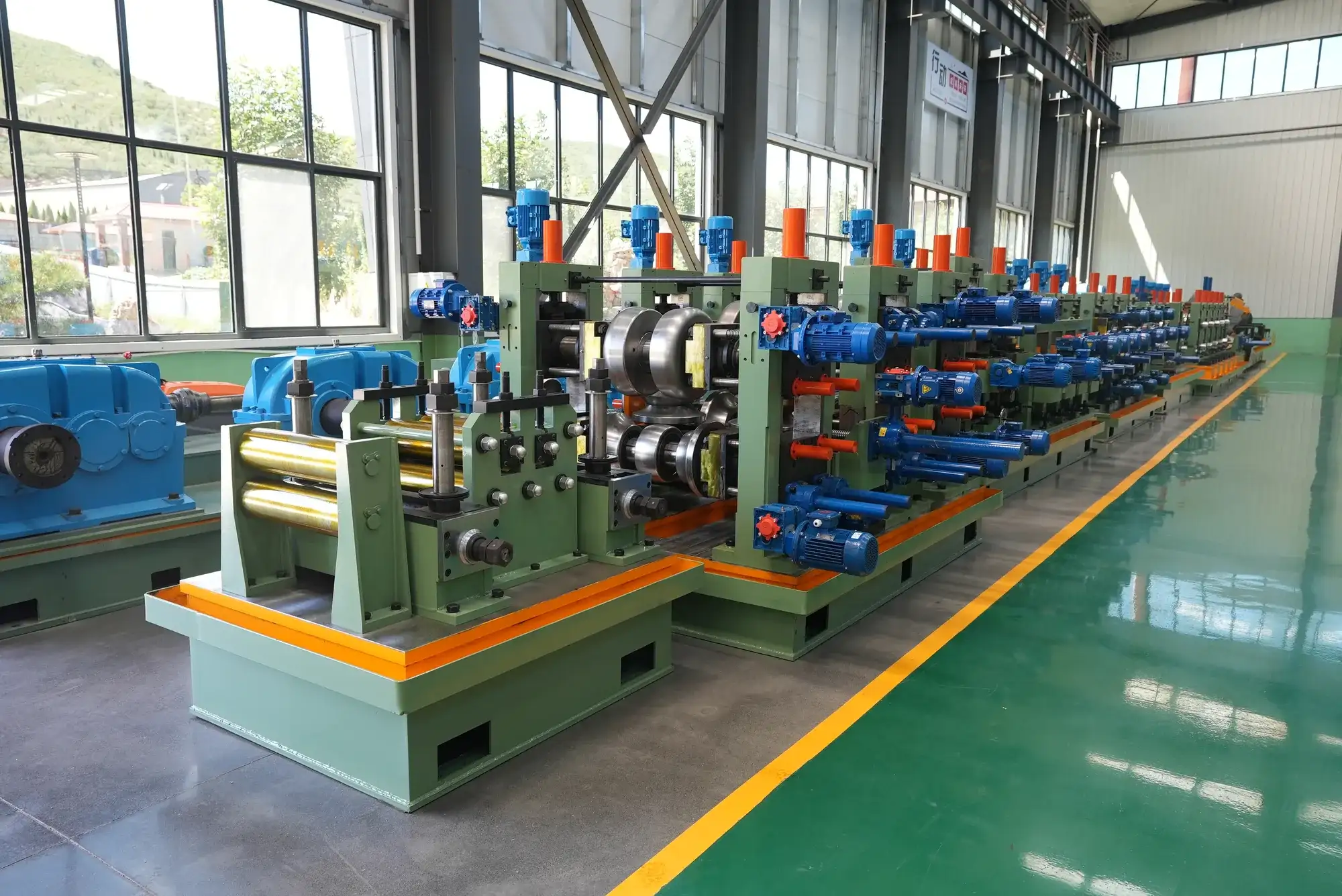 Forming and sizing stands of a tube mill