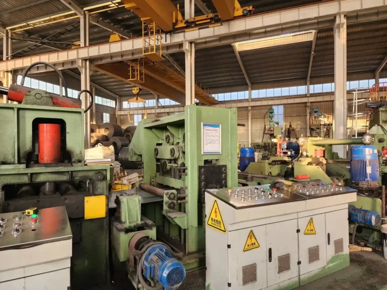 Operator console at the entry section of the spiral pipe mill