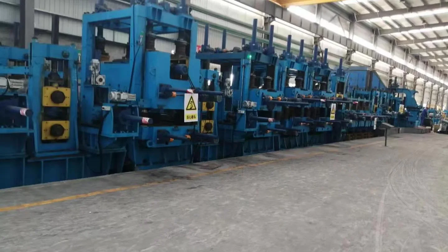 Forming stands of the API line pipe mill down the workshop bay