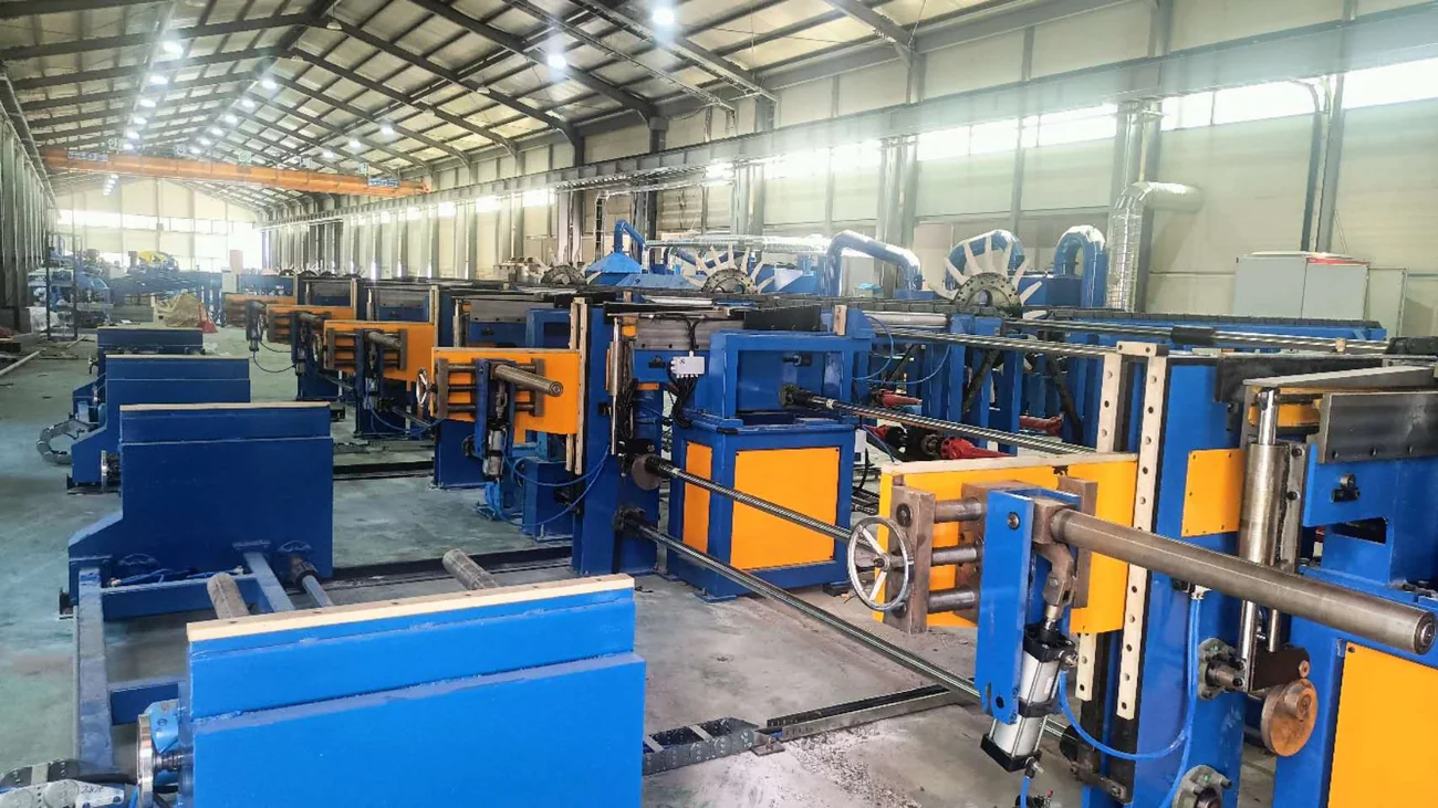 Feeding and cleaning stations of an auto spray paint line