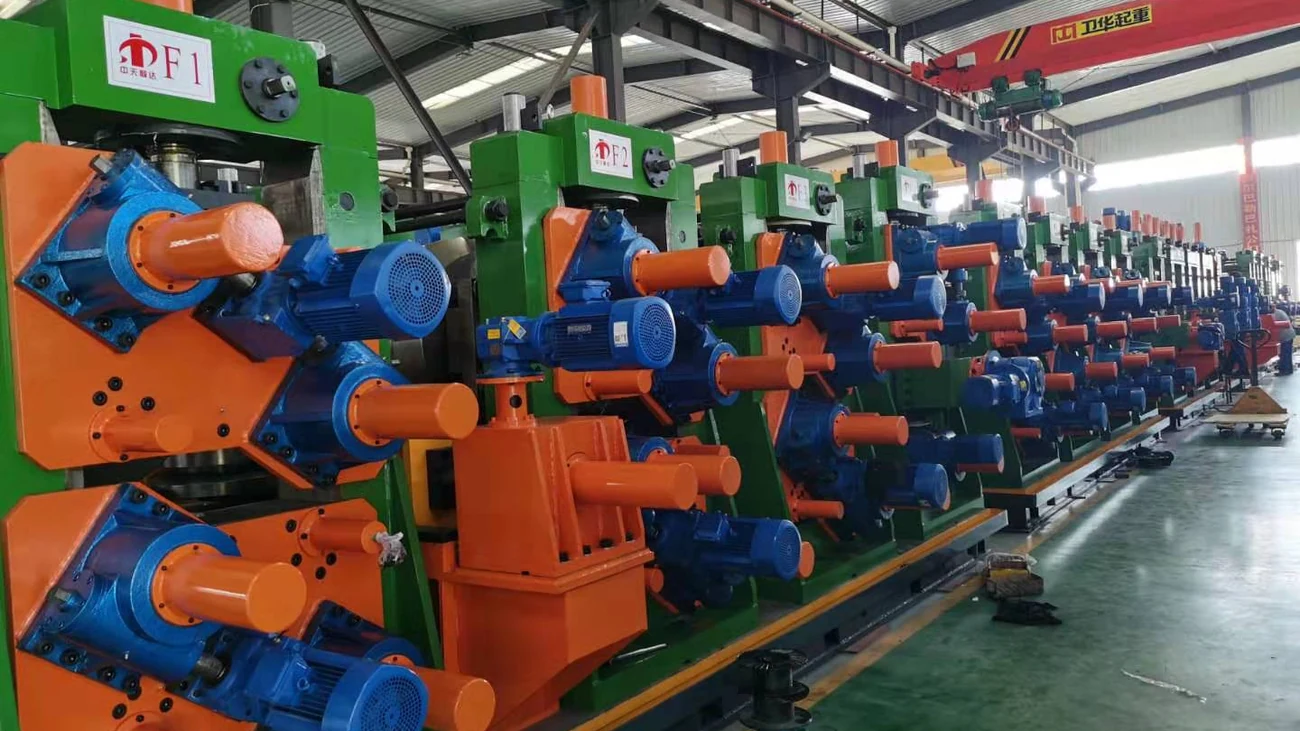 Direct forming stands with orange and blue servo drives