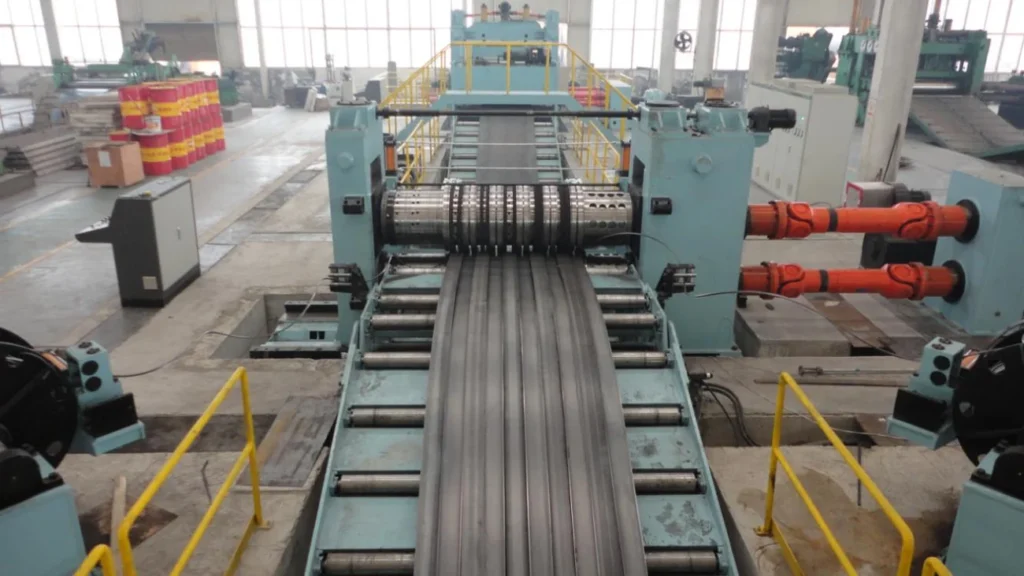 Slit strips leaving the knife shafts of a steel slitter